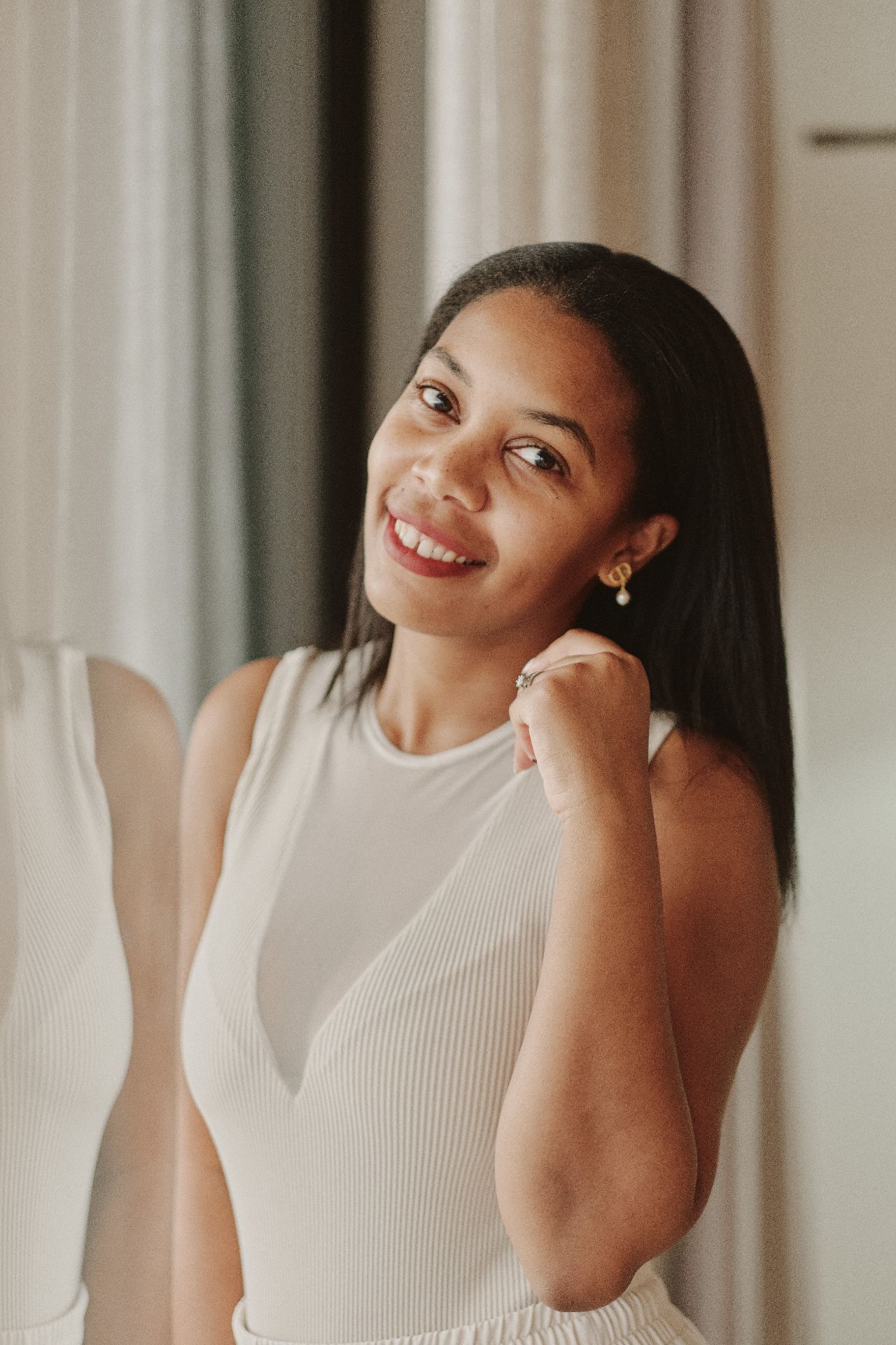 Carol Kabaale smiling in a professional portrait